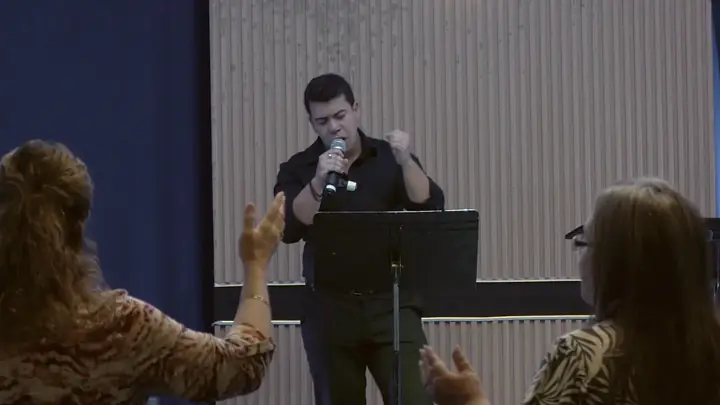 The congregation worshiping together